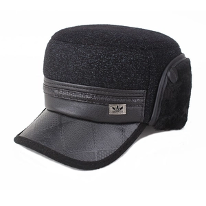 Casquette d'hiver pour homme noire avec protège-oreilles et texture en laine à carreaux