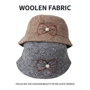 Elegant woolen cloche bucket hats with bow and pearl detail for women in fall winter