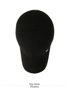 Close-up of black baseball cap featuring CLASSIC embroidery and a silver metal logo