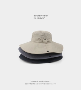 Three stacked wide brim sun hats in khaki, grey, and black with breathable side vents