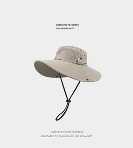 Macro shot of khaki outdoor sun hat featuring side snaps and adjustable windproof cord