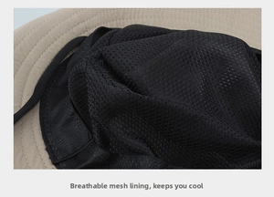 Macro view of breathable mesh lining and adjustable drawstring on khaki sun hat
