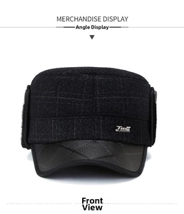 Détail d'un chapeau d'hiver pour hommes avec protège-oreilles en fourrure et bord en cuir