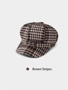 Classic brown plaid newsboy cap for women featuring vintage octagonal style and autumn texture