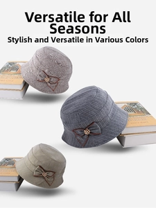 Detailed close-up of women's twill bucket hats with bow and sparkling floral button accents