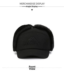 Detail of winter trapper hat featuring soft black faux fur lining and embroidered logo