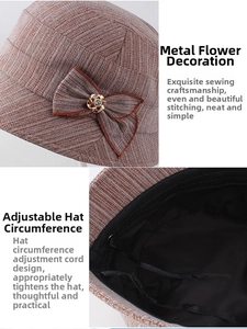 Detail view of brown textured bucket hat with metal floral ornament and inner drawstring