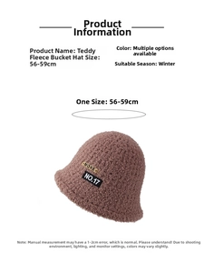 Detail of soft brown teddy fleece bucket hat featuring MORE NO.17 decorative patches