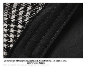 Detailed macro view of houndstooth beret showing thick sweatband and precise stitching