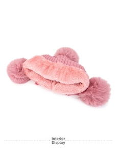 Detailed interior view of thick plush lining in a pink winter knit hat for warmth