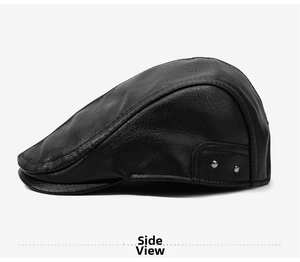 Detailed side profile of black faux leather flat cap with metallic rivet accents