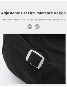 Detail of adjustable silver metal buckle on black newsboy cap for custom head sizing