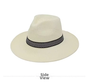 Side view of beige knit panama straw hat with black and white zigzag ribbon detail