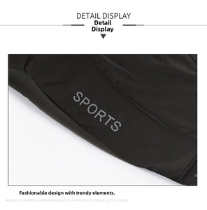 Detail shot of the breathable black fabric and SPORTS print on this elderly men's flat cap