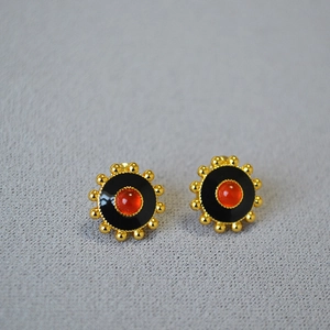 Minimalist gold-plated gear earrings with black enamel and carnelian agate inlay