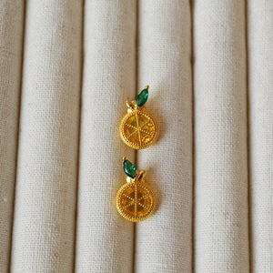 Elegant gold-plated lemon stud earrings with yellow cubic zirconia and green leaf detail