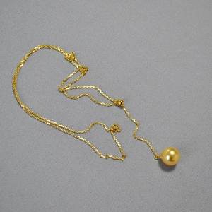 Collier en chaîne dorée élégante avec pendentif en perle dorée des mers du Sud réglable