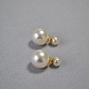 Elegant gold double pearl stud earrings with minimalist round white high-gloss finish