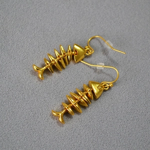 Vintage gold plated brass fishbone drop earrings with matte brushed metal texture