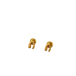Minimalist matte gold U-shaped horseshoe stud earrings with a sleek arched design