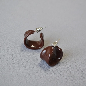 Glossy burgundy red enamel twist C-shape earrings with silver studs for minimalist style