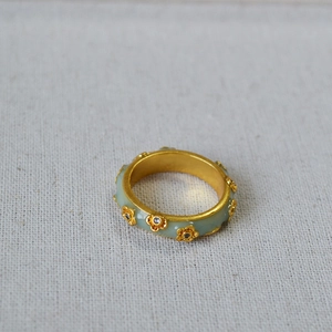 French vintage gold plated flower ring with green enamel finish and floral details