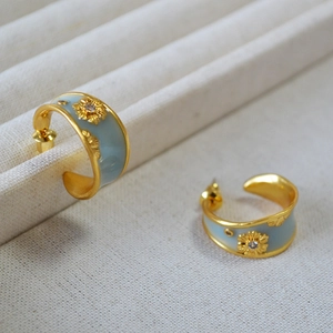 French retro C-shaped earrings with blue enamel, gold sunflower and zircon accents