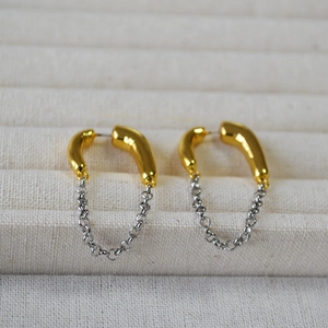 Modern two-tone chain tassel earrings with gold arc stud and silver linked loop