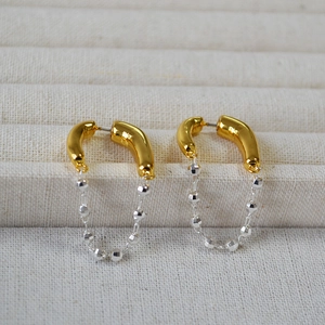Japanese style gold and silver chain fringe earrings with dynamic curved design