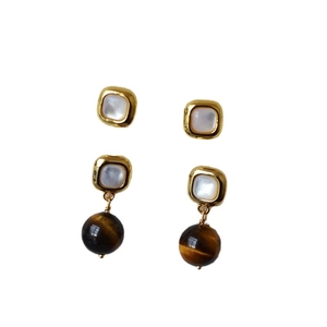 Square shell earrings with tiger eye stone pendants in a gold-plated vintage design