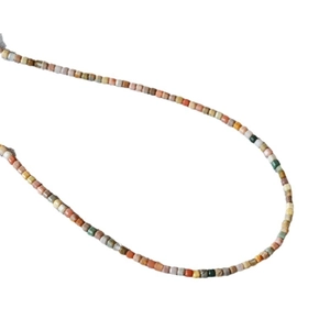 French vintage style necklace with colorful Alashan stone cube beads on white background