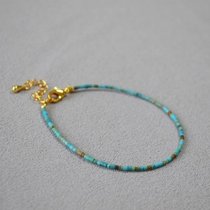 Bohemian turquoise and lapis lazuli beaded bracelet with adjustable gold lobster clasp