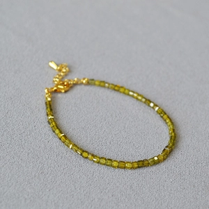 Elegant olive green square bead bracelet with golden lobster clasp and adjustable chain