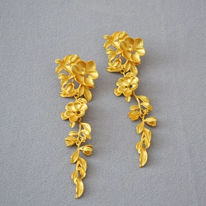 Exquisite brass gold plated floral tassel drop earrings with intricate vintage texture