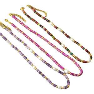 Colorful gemstone and freshwater pearl beaded necklaces in various vibrant summer colors