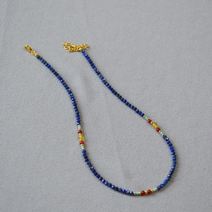 Lapis lazuli and carnelian beaded necklace with bohemian style and gold lobster clasp