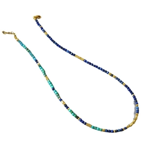 Lapis lazuli and turquoise beaded necklace with irregular silver accents and gold clasp