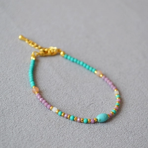 Minimalist turquoise and lavender beaded necklace with elegant gold metal accents