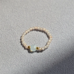 Handmade beaded sugar cube ring with light blue square stone and pink crystal beads