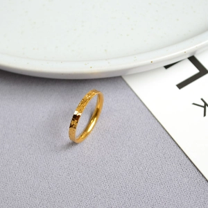 Elegant gold thin ring featuring unique dragon scale texture with a sparkling faceted finish