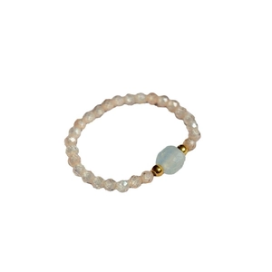Handmade beaded ring with light pink faceted beads and sky blue square stone center