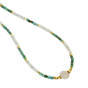 New Chinese retro turquoise freshwater pearl necklace with gold accents on white background