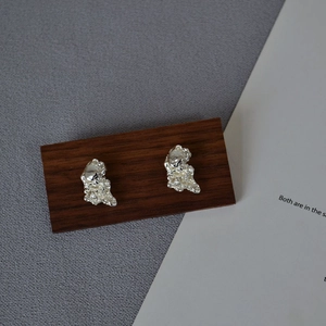 Irregular lava texture 925 silver stud earrings for women with organic metallic finish