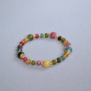 Chinese style handmade beaded bracelet with colorful tourmaline and gold floral accents