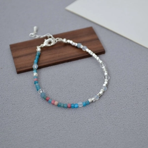 Detail of French beaded necklace with natural stones, silver beads and lobster clasp