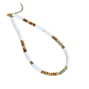Boho beaded necklace with white shell discs and green stone accents on a white background