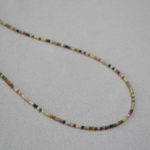 Elegant 2mm candy-colored natural tourmaline bead necklace for women on grey fabric