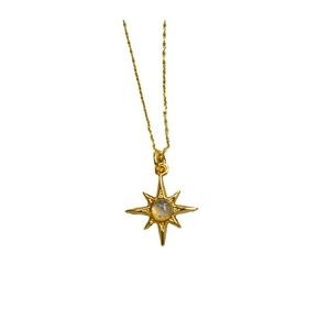 Gold plated brass starburst necklace with labradorite stone pendant on white background