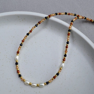 Retro style beaded necklace with baroque pearls blue facets and gold sand beads