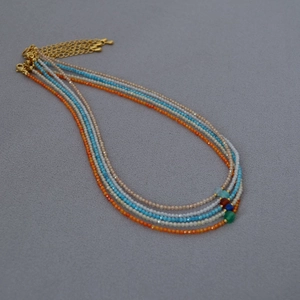Handmade multi-layer beaded necklace with colorful faceted stones and gold lobster clasp